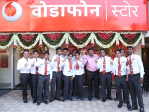 Employees of the newly launched Global Design Vodafone Store in Juhu, Mumbai